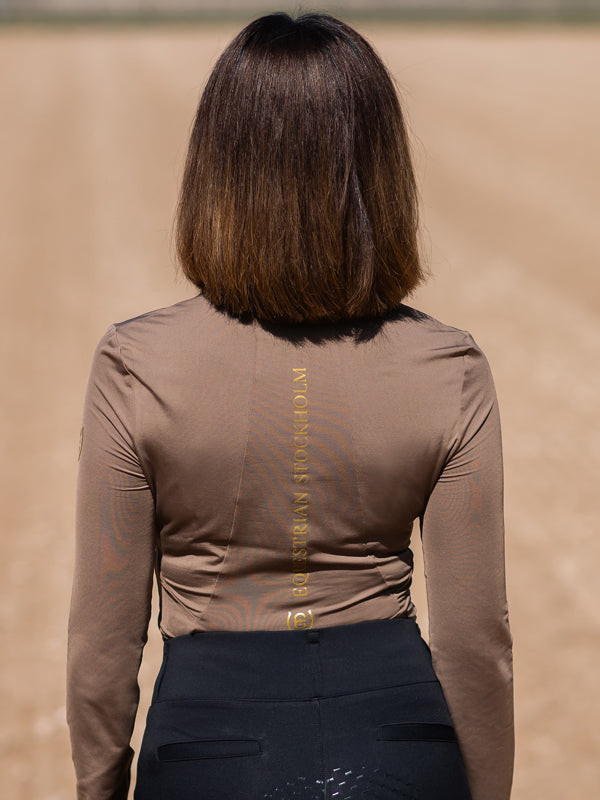 Polo UV Protection Equestrian Stockholm de mangas compridas para mulher Champanhe Bege Polo UV Protection Equestrian Stockholm de mangas compridas para mulher Champanhe Bege