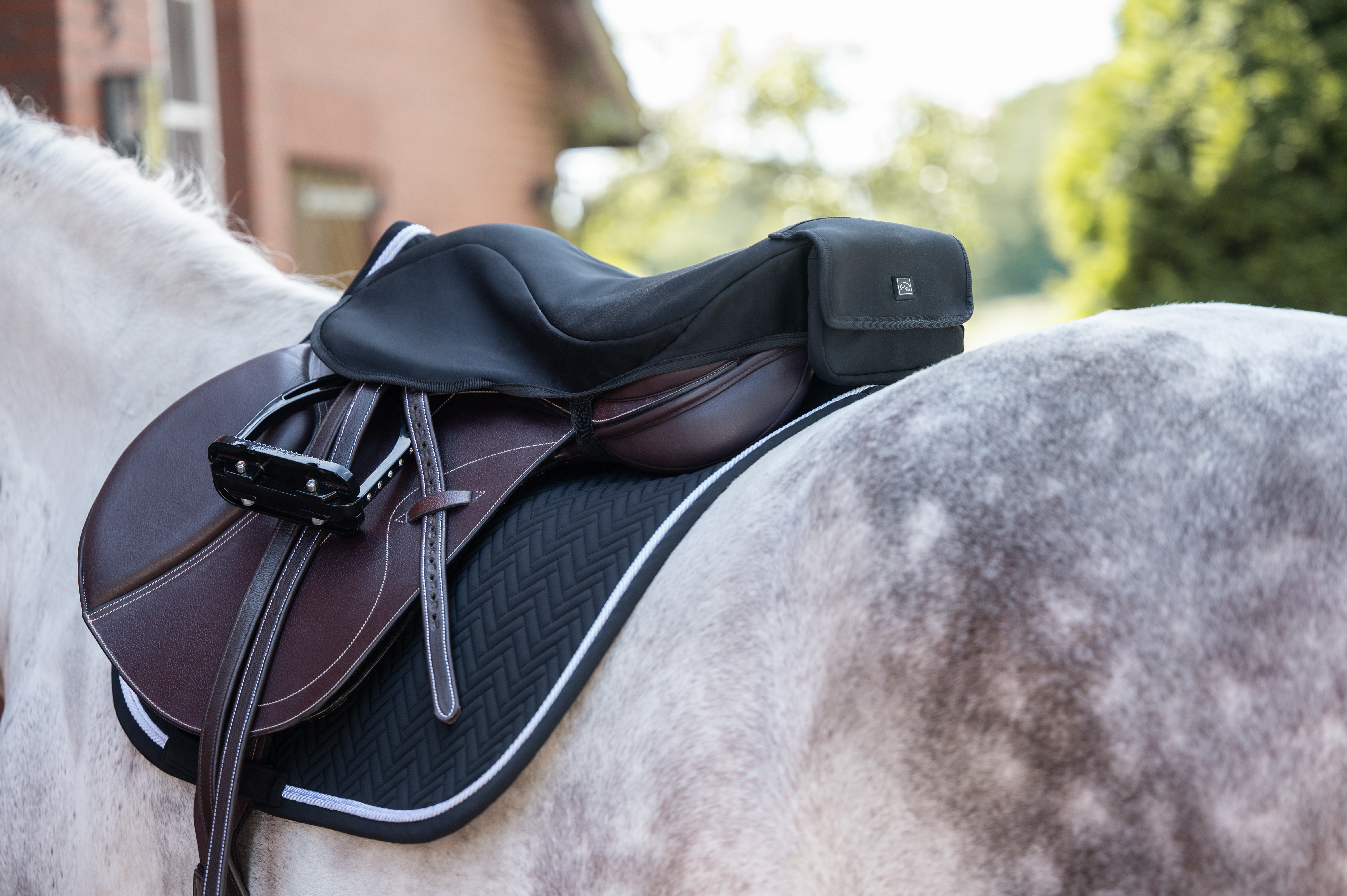 Capa de assento aquecida para sela de salto estilo HKM Preto