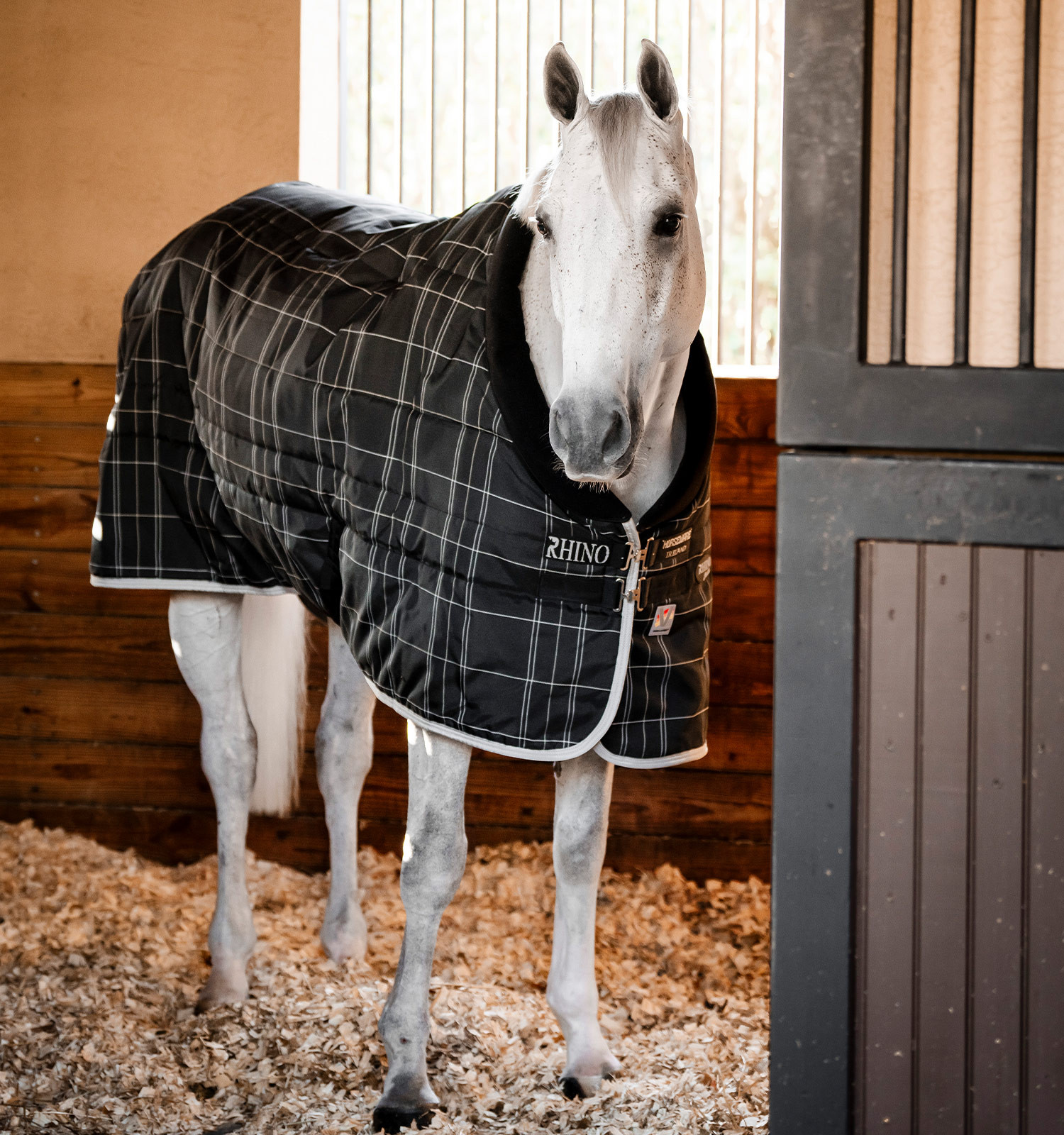 Cobertura de estábulo Horseware Rhino Original Vari-Layer 250g Preto / xadrez branco cinza