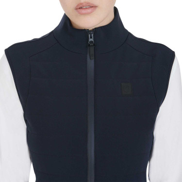 Colete em tecido técnico respirável feminino Kemi Equestro Colete em tecido técnico respirável feminino Kemi Equestro